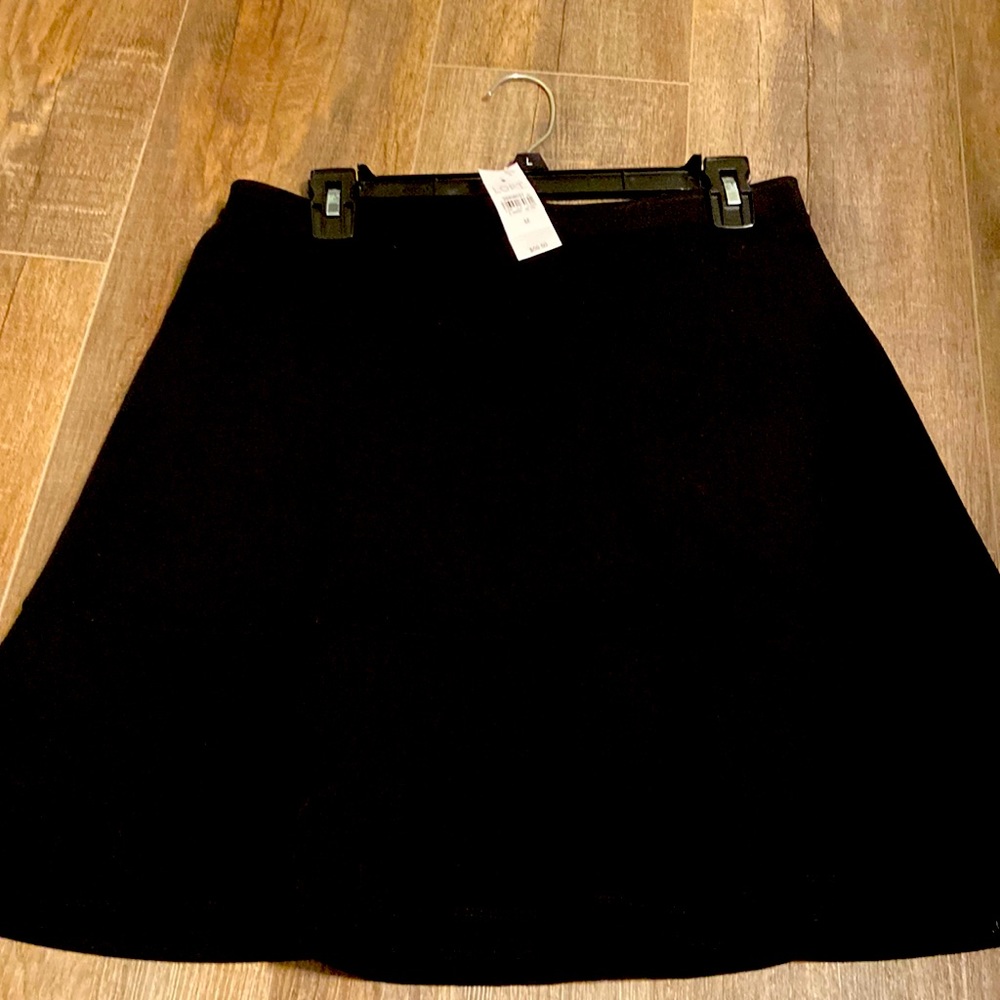 Woman’s black skirt